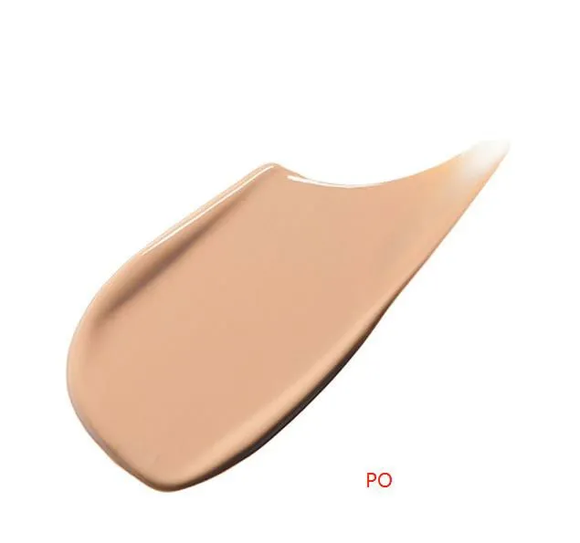Shiseido Clé de Peau Beauté Radiant Fluid Foundation Natural