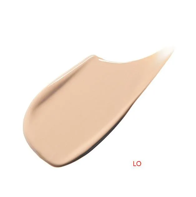 Shiseido Clé de Peau Beauté Radiant Fluid Foundation Natural